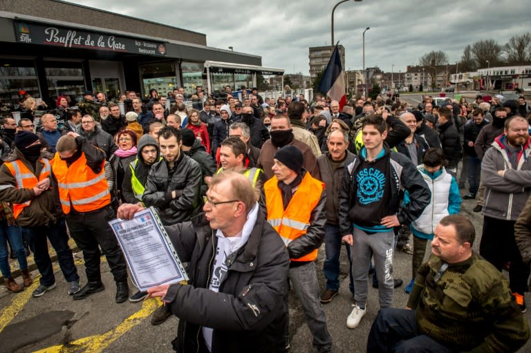 A crowd of around 150 protesters had gathered in central Calais carrying signs such as "This is our home," waving the French flag and singing the national anthem