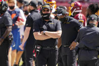 Washington Football Team head coach Ron Rivera, walking on the sidelines during the first half of an NFL football game against the Philadelphia Eagles, Sunday, Sept. 13, 2020, in Landover, Md. (AP Photo/Alex Brandon)