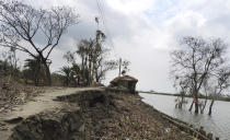 This May 22, 2020 photo shows the damage caused by Cyclone Amphan in Deulbari village, in South 24 Parganas district in the Sundarbans, West Bengal state, India. The cyclone that struck India and Bangladesh last month passed through the Sundarbans, devastating the islands that are home to one of the world’s largest mangrove forests and is a UNESCO world heritage site. (Samrat Paul via AP)