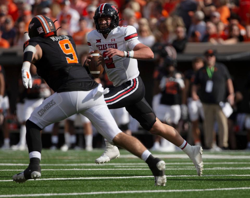 Texas Tech quarterback Behren Morton sprints out to pass while being pursued by Oklahoma State defensive end Brock Martin (9) during the Red Raiders' 41-31 loss Saturday in Stillwater, Oklahoma. The Red Raiders have an open date this week.