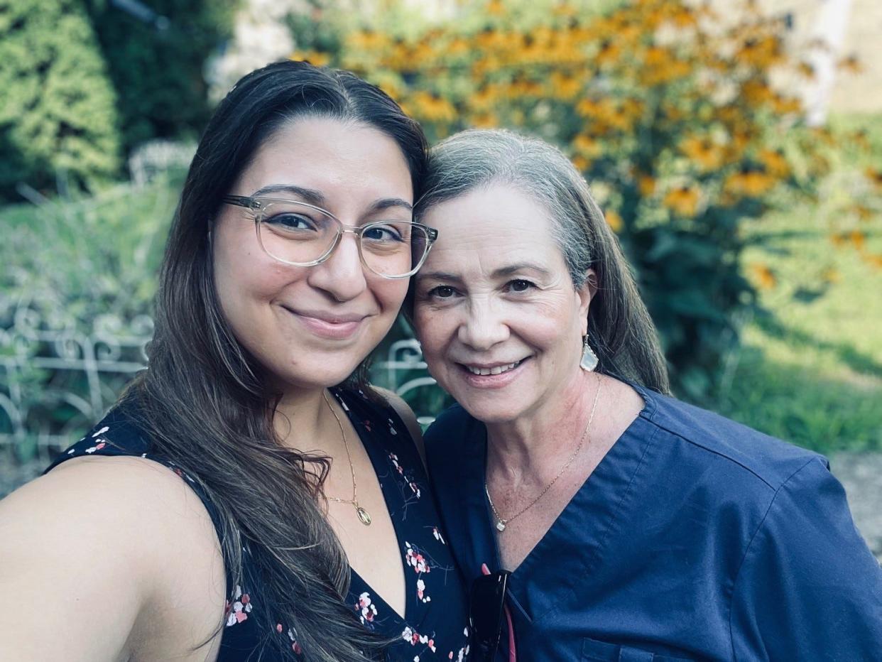 Woman and mother in law posing together