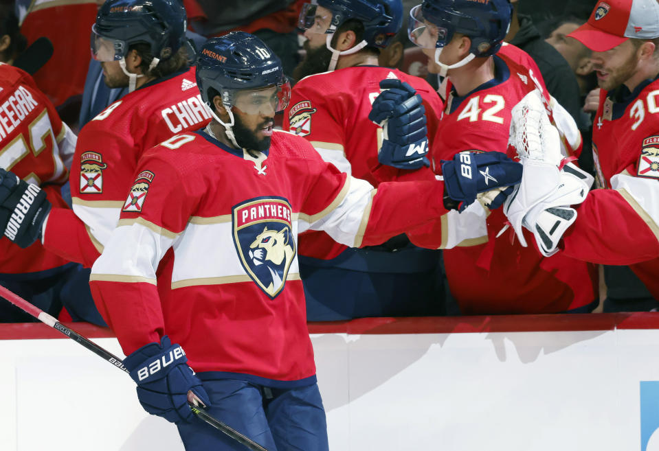 Florida Panthers left wing Anthony Duclair (10) celebrates his goal with the bench during the first period of Game 1 of an NHL hockey second-round playoff series against the Tampa Bay Lightning Tuesday, May 17, 2022, in Sunrise, Fla. (AP Photo/Reinhold Matay)