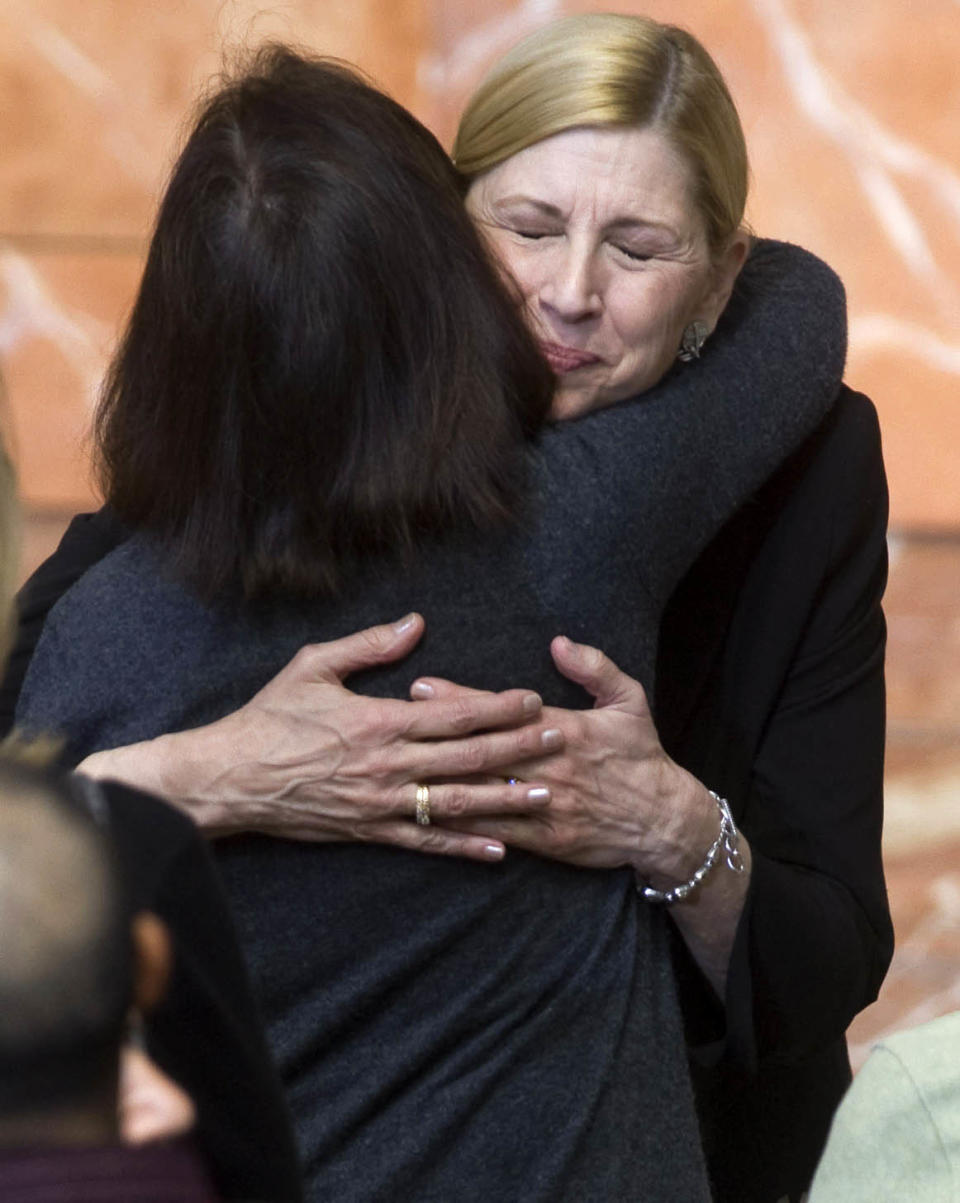 Crystal Cathedral Senior Pastor Sheila Schuller Coleman embraces well-wishers after services where she announced she will no longer be worshipping in the iconic building in Garden Grove, Calif., Sunday, March 11, 2012. Schuller Coleman also announced a new name for the church: Hope Center of Christ. (AP Photo/The Orange County Register, Mindy Schauer)