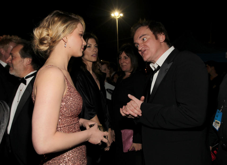 Jennifer and Quentin talk at an event