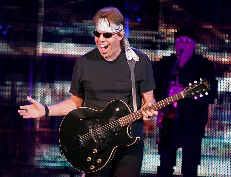 George Thorogood enjoys a receptive crowd response as he and his band the Destroyers perform to a sold out audience at the Northern Lights Theater at Potawatomi Casino on Thursday, August 18, 2011.  The singer will perform Sunday at the Peabody Auditorium in Daytona Beach.