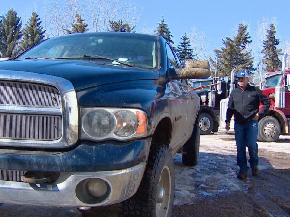 Alberta-based farmer Matt Sawyer receives a delivery of diesel, used to power his farm's trucks and tractors. Russia's invasion of Ukraine — and how countries are curtailing shipments of Russian oil — is having a significant impact of fuel prices around the globe. (Kyle Bakx/CBC - image credit)