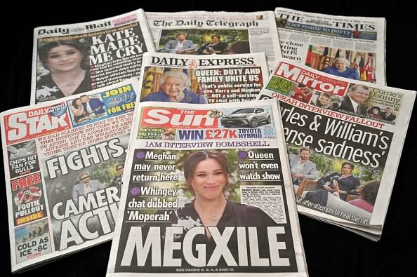 <div class="inline-image__caption"><p>An arrangement of UK daily newspapers photographed as an illustration in Brighton on March 8, 2021, shows front page headlines reporting on the story of the interview given by Meghan, Duchess of Sussex, wife of Britain's Prince Harry, Duke of Sussex, to Oprah Winfrey, which aired on US broadcaster CBS.</p></div> <div class="inline-image__credit">GLYN KIRK/AFP via Getty Images</div>