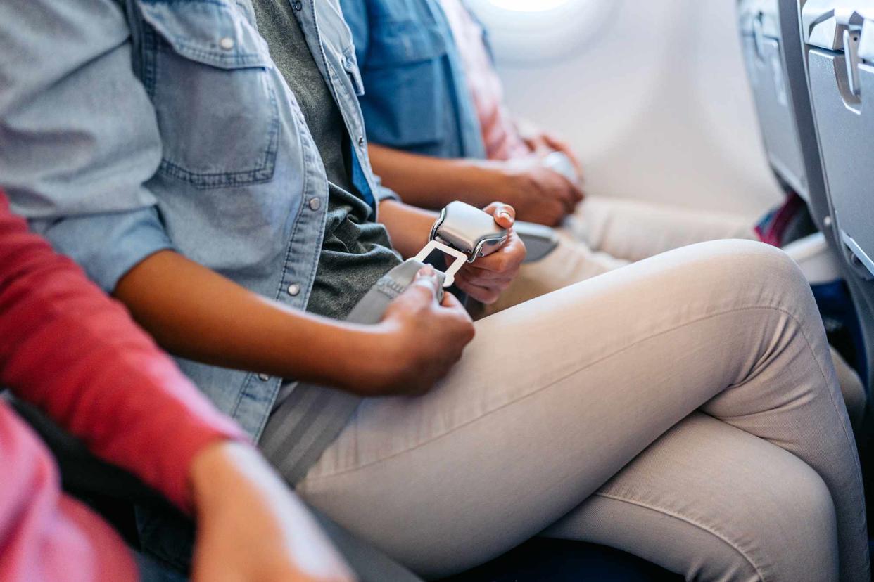 <p>Getty</p> Passengers on an airplane (stock image)