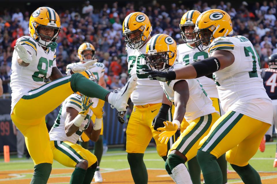 Green Bay Packers wide receiver Romeo Doubs (87) celebrates with teammates after scoring on a touchdown reception against the Chicago Bears in the first quarter during their football game Sunday, September 10, 2023, at Soldier Field in Chicago, Ill. Dan Powers/USA TODAY NETWORK-Wisconsin. 
