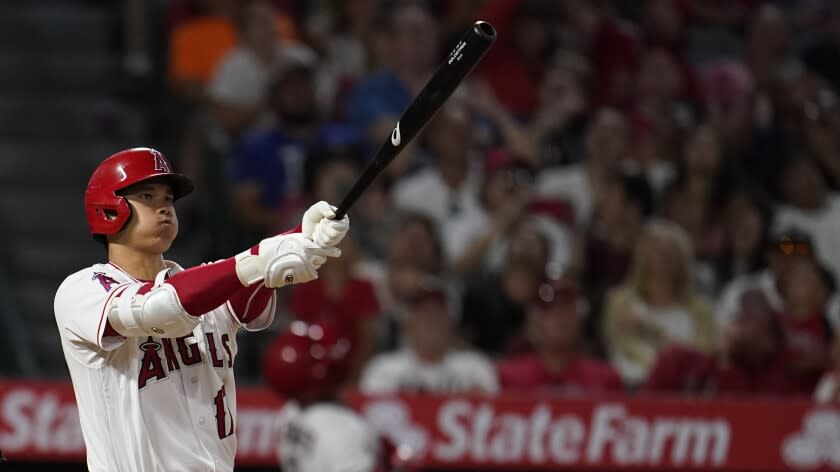 Los Angeles Angels' Shohei Ohtani bats during a baseball game against the Seattle Mariners Tuesday, Aug. 16, 2022, in Anaheim, Calif. (AP Photo/Marcio Jose Sanchez)