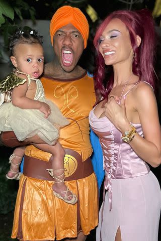 <p>Alyssa Scott/Instagram</p> Nick Cannon as Hercules, Alyssa Scott as Megara, and Halo as an angel