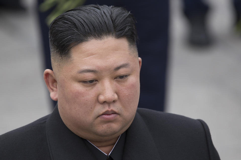 FILE - In this April 26, 2019, file photo, North Korean leader Kim Jong Un attends a wreath laying ceremony in Vladivostok, Russia. North Korea called former U.S. Vice President Joe Biden a “rabid dog” that “must be beaten to death with a stick” in its latest swipe against foreign and political leaders it sees as hostile to the North’s leadership. The commentary published by Pyongyang’s official Korean Central News Agency said Friday, Nov. 15, 2019, the U.S. presidential hopeful “reeled off a string of rubbish against the dignity” of the North’s supreme leadership and deserves “merciless punishment.” (AP Photo/Alexander Khitrov, File)