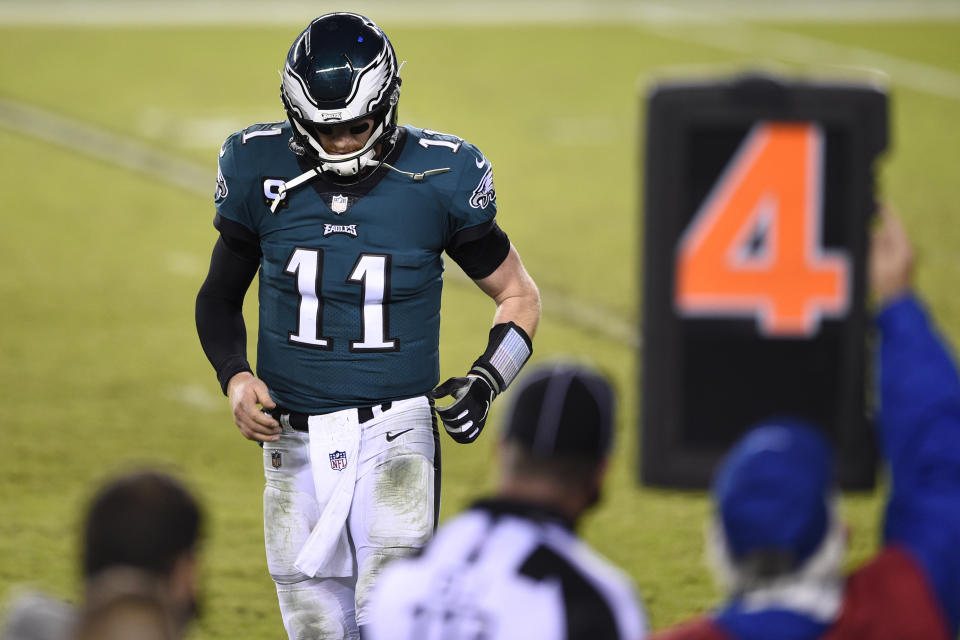 Philadelphia Eagles' Carson Wentz walks off the field during the second half of an NFL football game against the Seattle Seahawks, Monday, Nov. 30, 2020, in Philadelphia. (AP Photo/Derik Hamilton)