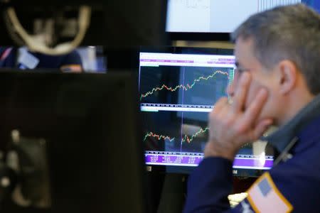 A trader works on the floor of the New York Stock Exchange (NYSE) in New York, United States March 29, 2017. REUTERS/Brendan McDermid