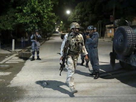 Afghan security forces arrive at the site of an attack in Kabul May 13, 2015. REUTERS/Omar Sobhani