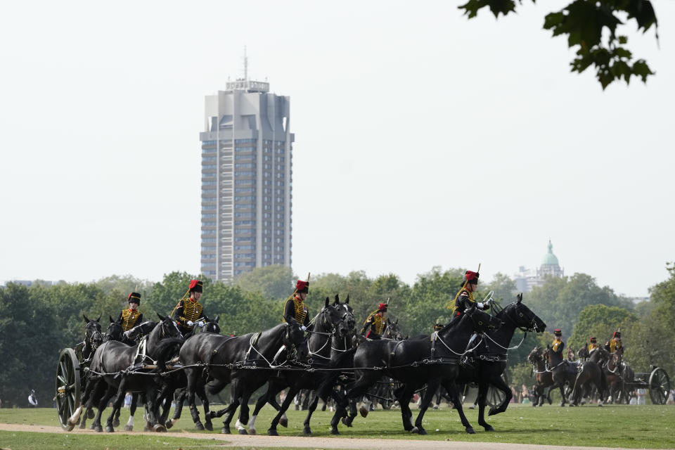 The King's Troop Royal Horse Artillery leave after firing a 41 Gun Royal Salute supported by the Band of the Grenadier Guards, on the first anniversary of the death of Queen Elizabeth II, in Hyde Park in London, Friday, Sept. 8, 2023. (AP Photo/Kirsty Wigglesworth)