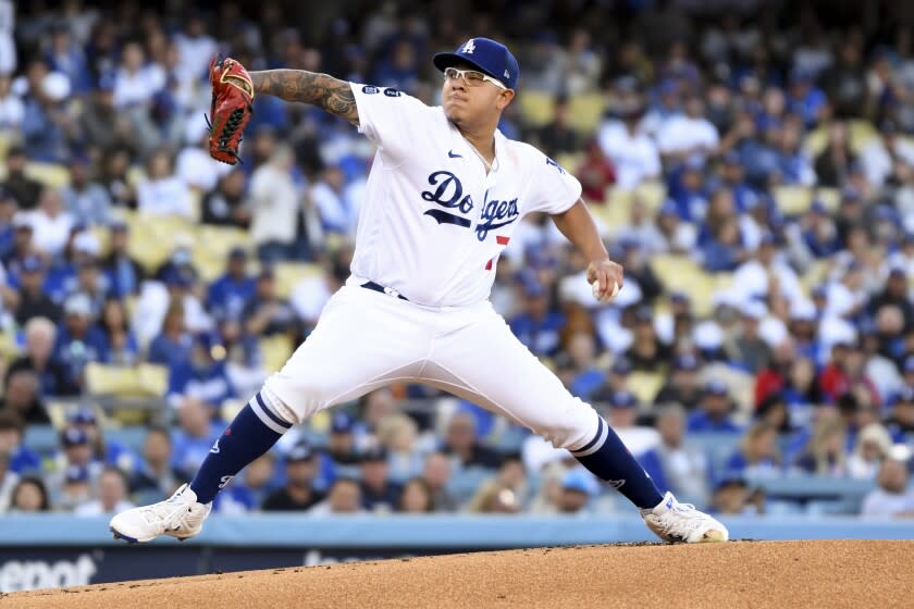 Los Angeles, CA - October 20: Los Angeles Dodgers starting pitcher Julio Urias delivers a pitch during the first inning in game four in the 2021 National League Championship Series against the Atlanta Braves at Dodger Stadium on Wednesday, Oct. 20, 2021 in Los Angeles, CA. (Wally Skalij / Los Angeles Times)