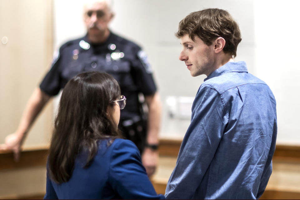 Logan Clegg talks with defense attorney Maya Dominguez at his trial at Merrimack County Superior Court, Tuesday, Oct. 3, 2023, in Concord, N.H. Clegg is accused in the shooting deaths of Steve and Wendy Reid in April of 2022. (Geoff Forester/The Concord Monitor via AP, Pool)