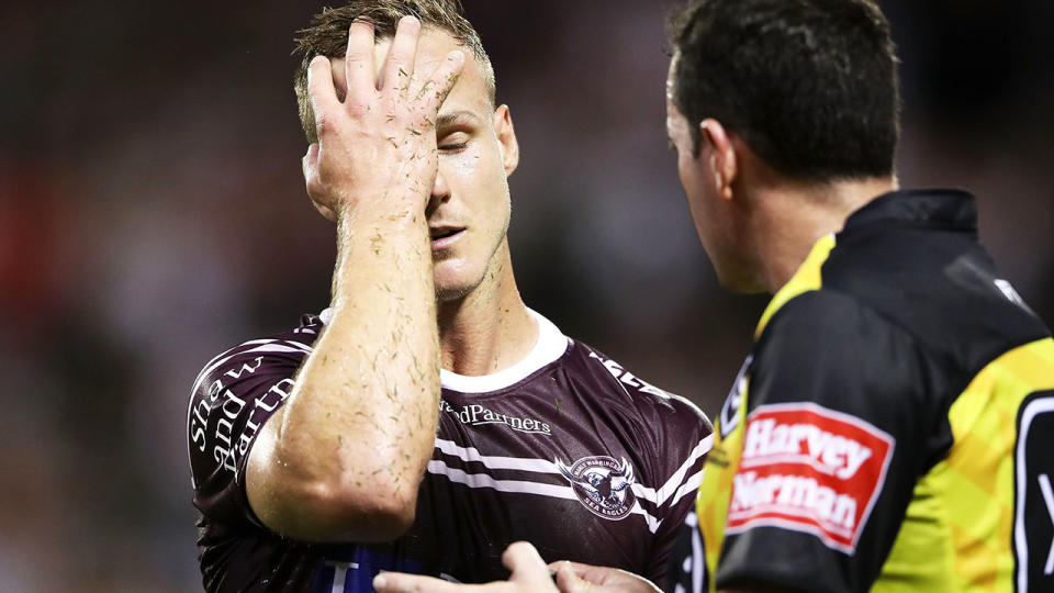 Daly Cherry-Evans of the Sea Eagles reacts as he speaks to referee Dave Munro. (Photo by Mark Kolbe/Getty Images)