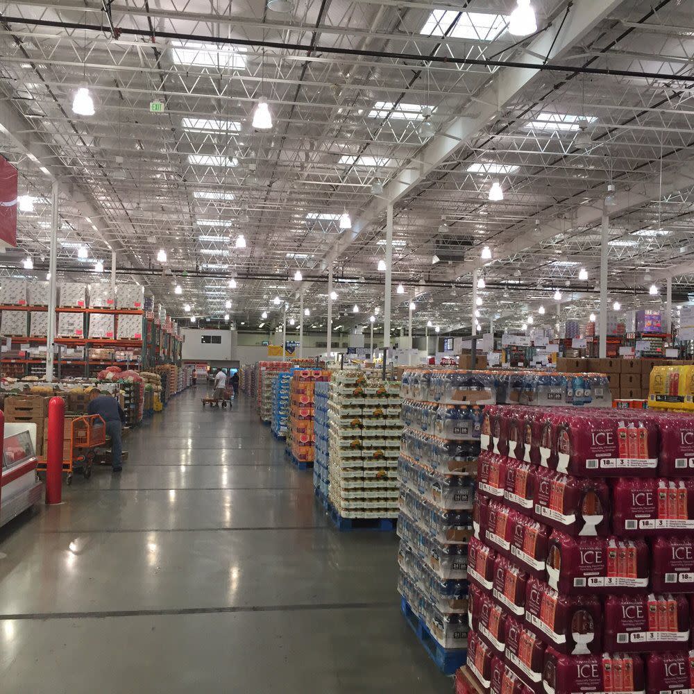 A shot down a Costco Business Center aisle shows a sharp contract to how busy a regular Costco is compared to a business center location.