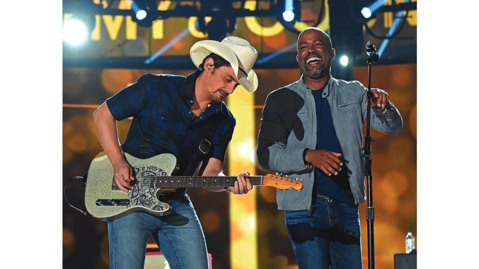 <em>Brad Paisley, left, and Rucker at the Academy of Country Music Awards in 2015.</em>