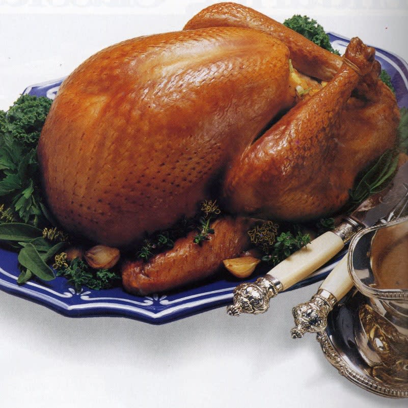 This roast turkey recipe comes from the Bon Appètit November 1991 issue and is part of our Thanksgiving Hall of Fame series. Like loads of things, an oldie but a goodie. <a href="https://www.bonappetit.com/recipe/cider-roast-turkey-with-applejack-gravy?mbid=synd_yahoo_rss" rel="nofollow noopener" target="_blank" data-ylk="slk:See recipe.;elm:context_link;itc:0;sec:content-canvas" class="link ">See recipe.</a>