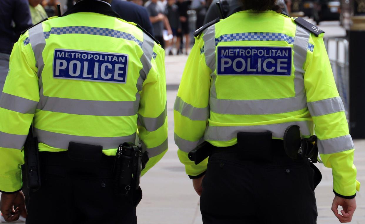 Metropolitan Police Officers patrolling on Whitehall, London