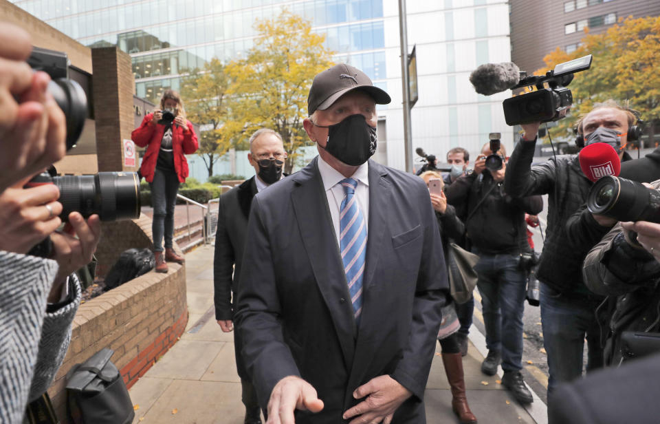 Boris Becker leaves Southwark Crown Court in London, Thursday, Oct. 22, 2020. German tennis star Boris Becker is charged with 19 offences of failing to disclose money and property as part of bankruptcy proceedings. (AP Photo/Frank Augstein)