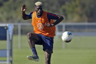 Gyasi Zardes, a forward on the U.S. Men's National Soccer team, plays the ball during drills Wednesday, Jan. 8, 2020, in Bradenton, Fla. The team moved its training camp from Qatar to Florida in the wake of Iran's top military commander being killed during a U.S. airstrike in the Middle East. (AP Photo/Chris O'Meara)