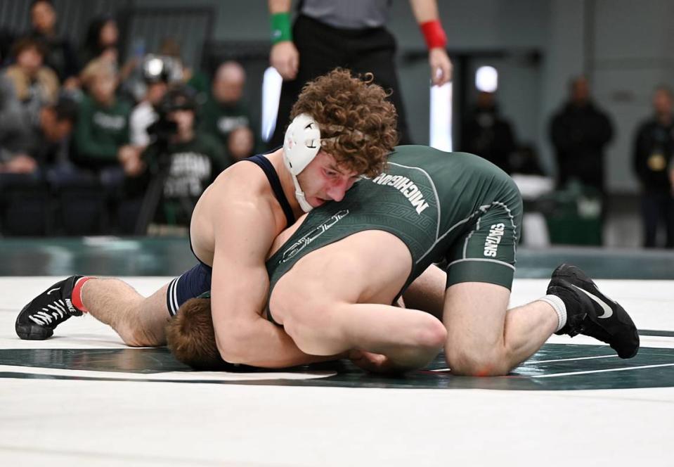 Penn State’s Mitchell Mesenbrink controls Michigan State’s Caleb Fish in their 165-pound bout of the Nittany Lions’ 35-0 win on Sunday at East Lansing, Mich. Mesenbrink took care of Fish, 18-8.