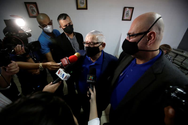 Rodrigo Campos and his partner Marcos Castillo speak to the media following their marriage ceremony, after Costa Rica legalised same-sex marriage, in San Jose