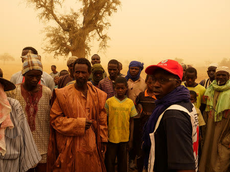 Villagers are seen following the March 23 attack by militiamen that killed about 160 Fulani people, in Ogossagou Village, Mali, March 31, 2019 in this handout picture obtained April 18, 2019. ICRC via REUTERS