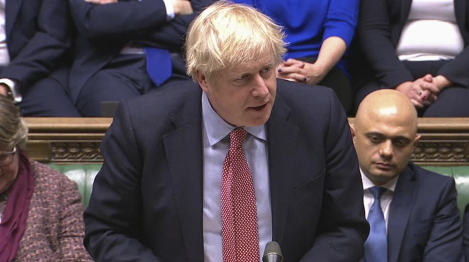 In this image taken from video, Prime Minister Boris Johnson speaks in the House of Commons, London, Tuesday Dec. 17, 2019. Buoyed by a Conservative majority in Parliament, British Prime Minister Boris Johnson signaled Tuesday he won’t soften his Brexit stance, ruling out any extension of an end-of-2020 deadline to strike a trade deal with the European Union. (House of Commons via AP)