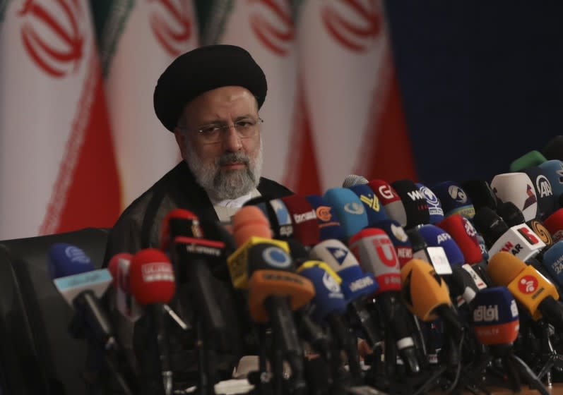 Iran's new President-elect Ebrahim Raisi speaks during a press conference in Tehran, Iran, Monday, June 21, 2021. (AP Photo/Vahid Salemi)