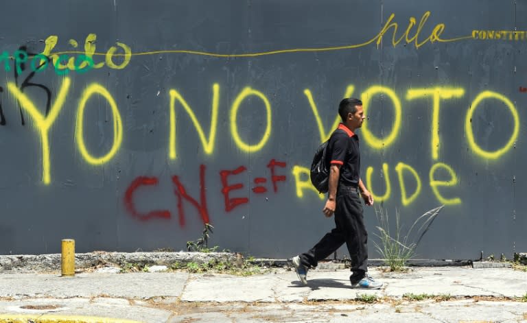 "I'm not voting" reads graffiti sprayed on a wall in Caracas a day before Venezuela's election which saw a historic abstention rate of 52%