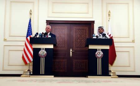 U.S. Secretary of State Rex Tillerson and Qatar's Foreign Minister Sheikh Mohammed bin Abdulrahman Al Thani listen to a reporter's question during a media availability, in Doha, Qatar October 22, 2017. REUTERS/Alex Brandon/Pool