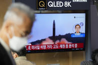 A TV screen showing a news program reporting about North Korea's missile launch with file footage, is seen at the Seoul Railway Station in Seoul, South Korea, Thursday, Nov. 3, 2022. North Korea continued its barrage of weapons tests on Thursday, firing at least three missiles including a suspected intercontinental ballistic missile that forced the Japanese government to issue evacuation alerts and temporarily halt trains. (AP Photo/Lee Jin-man)