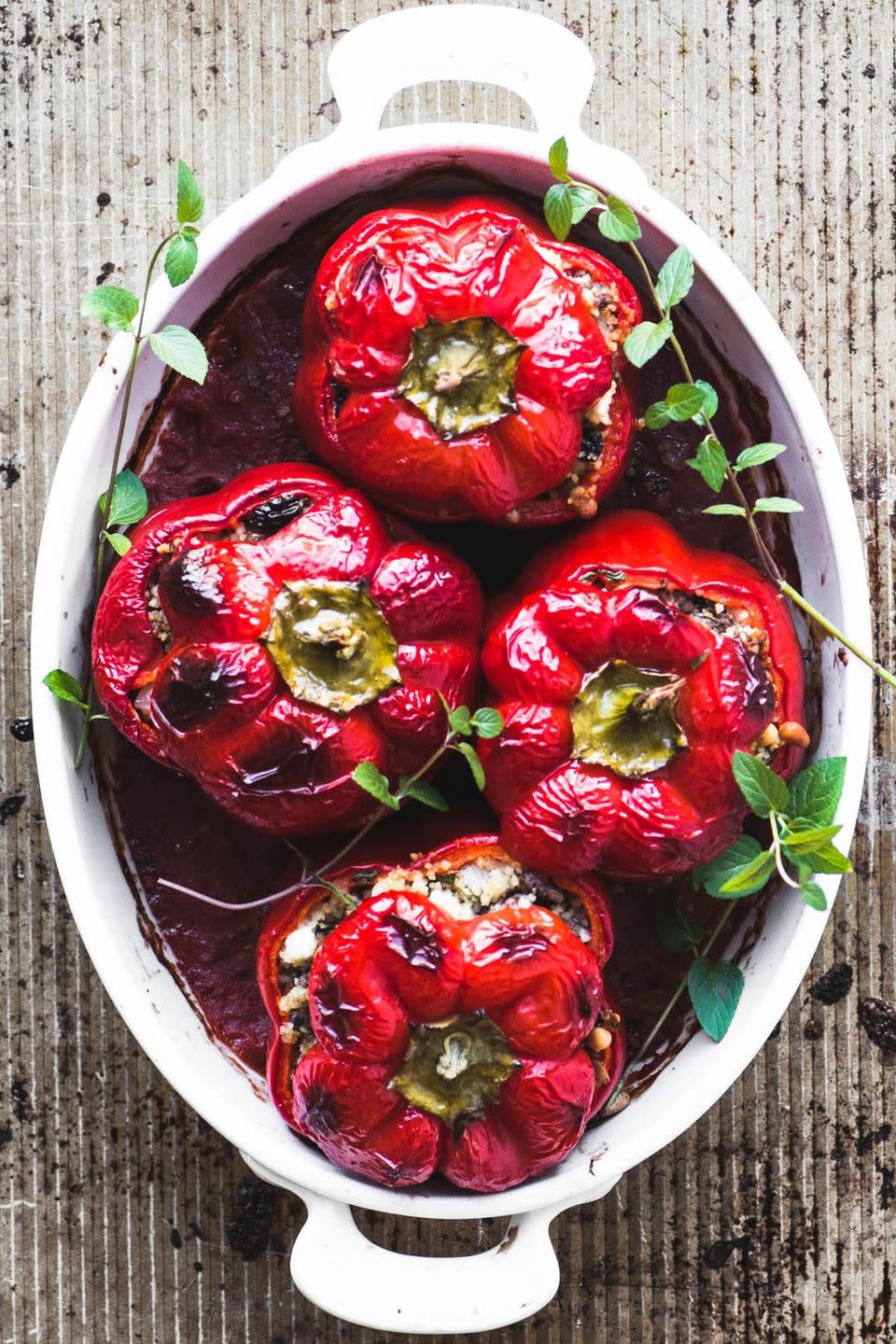<p>Classic stuffed peppers, but with an exotic makeover! And we love the look of them. Lightly spiced with cinnamon, allspice, cardamom, and nutmeg, these are bound to taste just as good as they look!</p><p>Get the <a href="https://theviewfromgreatisland.com/spiced-lamb-and-couscous-stuffed-peppers-recipe/" rel="nofollow noopener" target="_blank" data-ylk="slk:Spiced Lamb & Couscous Stuffed Peppers;elm:context_link;itc:0;sec:content-canvas" class="link ">Spiced Lamb & Couscous Stuffed Peppers</a> recipe.</p><p>Recipe from <a href="https://theviewfromgreatisland.com/" rel="nofollow noopener" target="_blank" data-ylk="slk:The View From Great Island;elm:context_link;itc:0;sec:content-canvas" class="link ">The View From Great Island</a>.</p>