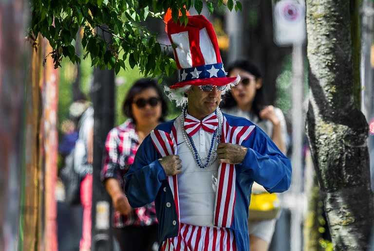 A US fan walks near the fanzone in Vancouver on July 4, 2015, on the eve of the 2015 FIFA Women's World Cup final against Japan