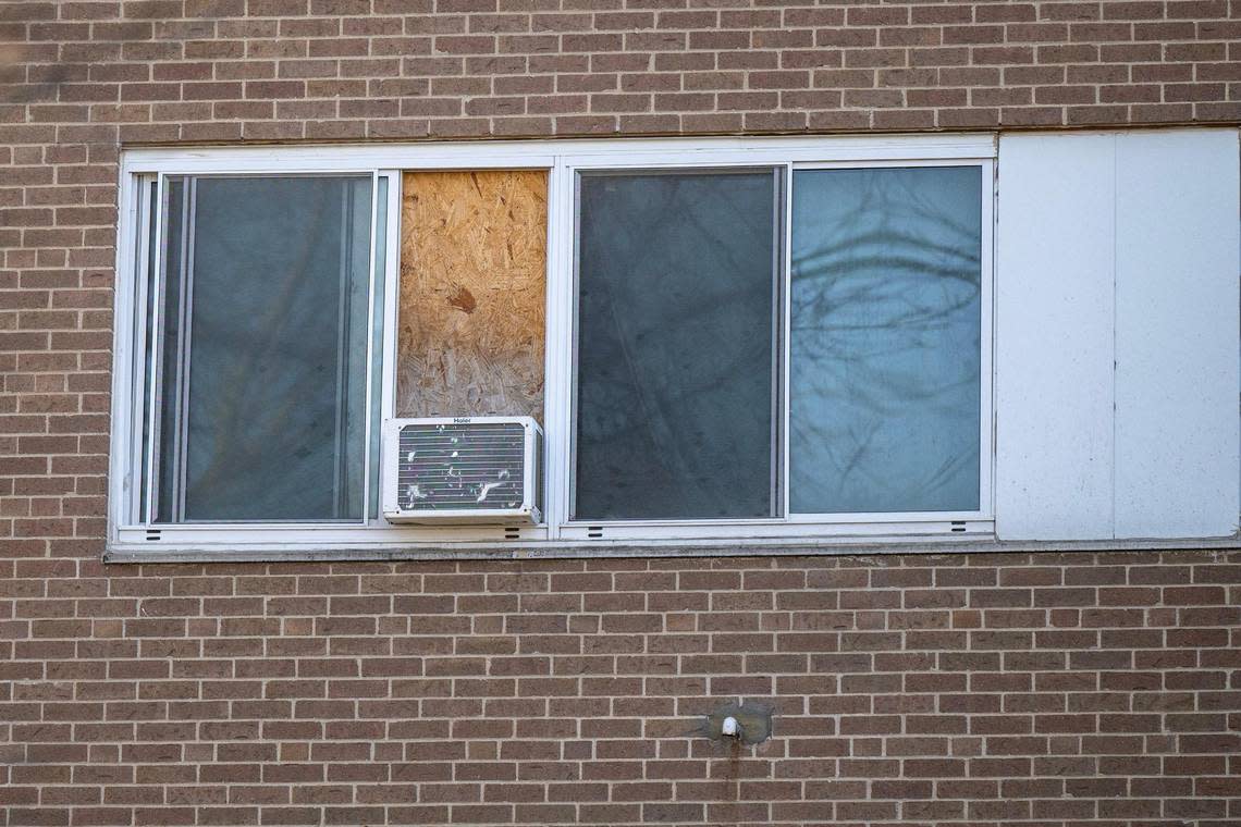 A boarded-up window is seen at the Independence Towers on Tuesday, March 19, 2024, in Independence, Mo.