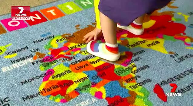 The toddler points out Kazakstan on a map. Source: 7 News