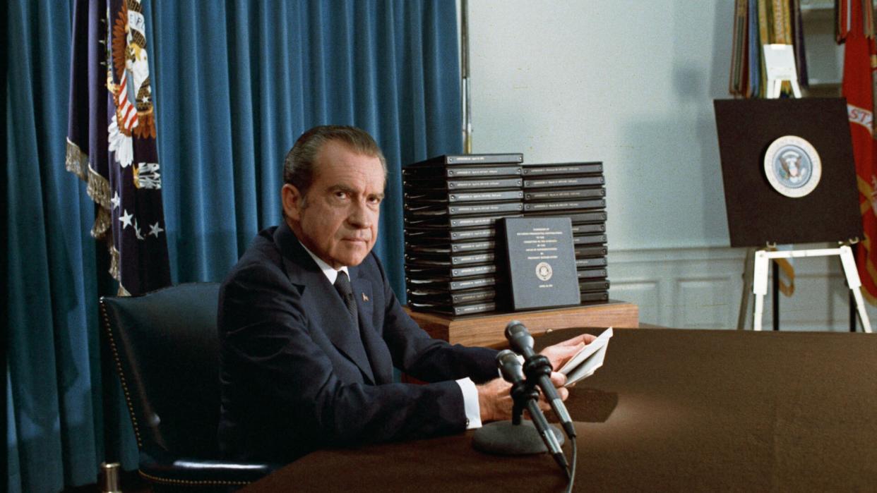 President Nixon with his edited transcripts of the White House Tapes subpoenaed by the Special Prosecutor, during his speech to the Nation on Watergate.