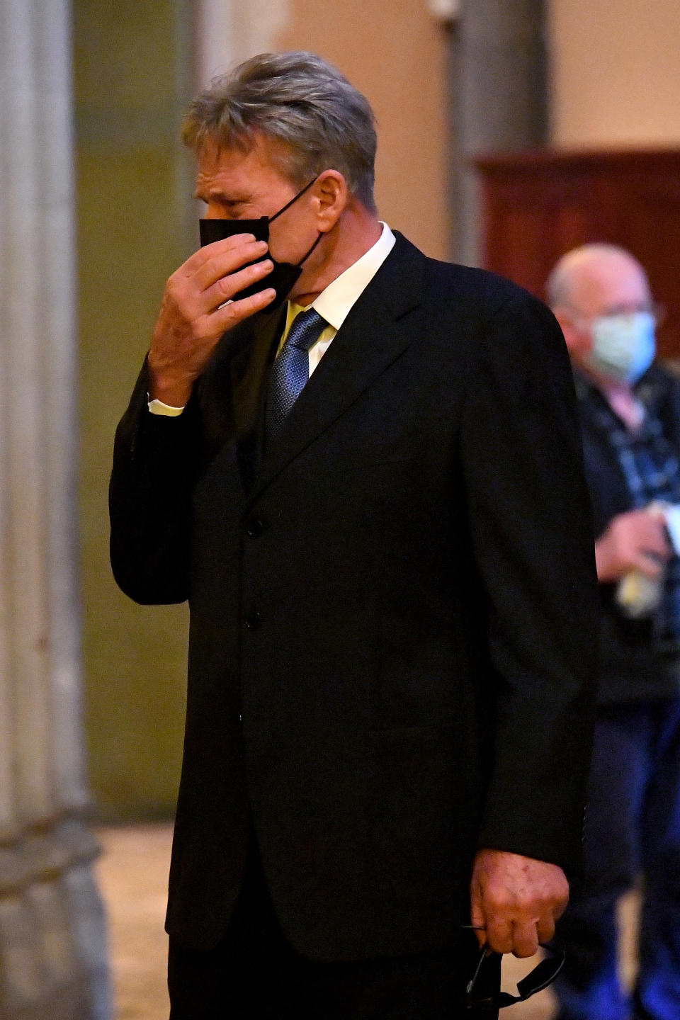 Sam Newman was clearly upset as he arrived. Photo: AAP