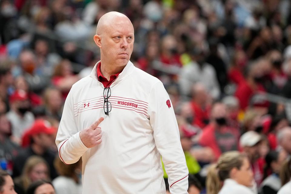 Wisconsin coach Kelly Sheffield motions to his team during the 2021 NCAA volleyball tournament in Columbus, Ohio.