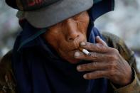 The Wider Image: Cash for trash: Indonesia village banks on waste recycling