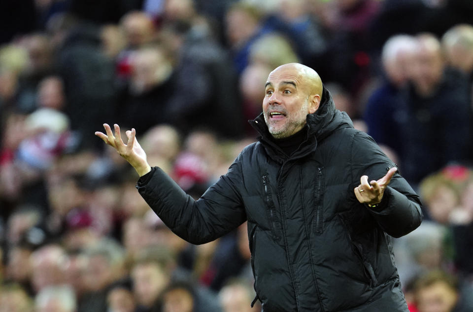 Manchester City's head coach Pep Guardiola reacts during the English Premier League soccer match between Liverpool and Manchester City at Anfield stadium in Liverpool, Sunday, Oct. 16, 2022. (AP Photo/Jon Super)