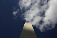 Clouds roll over the Washington Monument, as seen from the foot of the monument, during a press preview tour ahead of its official reopening, Wednesday, Sept. 18, 2019, in Washington. The monument, which has been closed to the public since August 2016, is scheduled to re-open Thursday, Sept. 19. (AP Photo/Patrick Semansky)