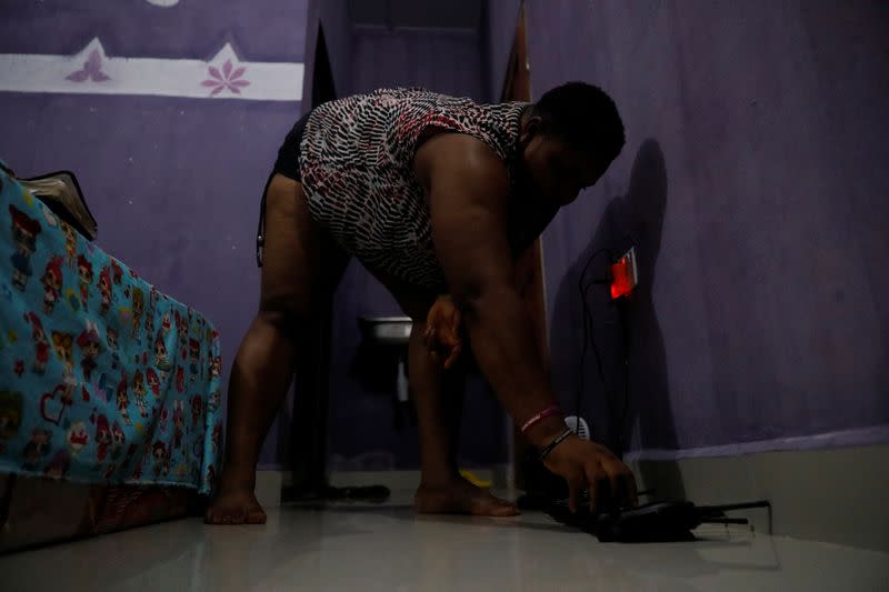 The Wider Image: Nigeria's female bouncers show their strength fighting stereotypes