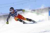 Canada's James Crawford competes during the super G portion of the men's combined race, at the alpine ski World Championships, in Cortina d'Ampezzo, Italy, Monday, Feb. 15, 2021. (AP Photo/Marco Trovati)