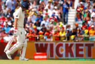 Cricket - Australia v England - Ashes test match - WACA Ground, Perth, Australia, December 17, 2017 - England's captain Joe Root reacts as he walks off the ground after being dismissed during the fourth day of the third Ashes cricket test match. REUTERS/David Gray